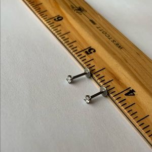 Neometal earrings. Titanium and fake diamond. Bought at Iris Studio Brooklyn.